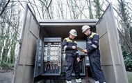 Men assessing switchgear