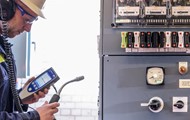 Man holding and testing an equipment - Ultra Tev Plus Header 